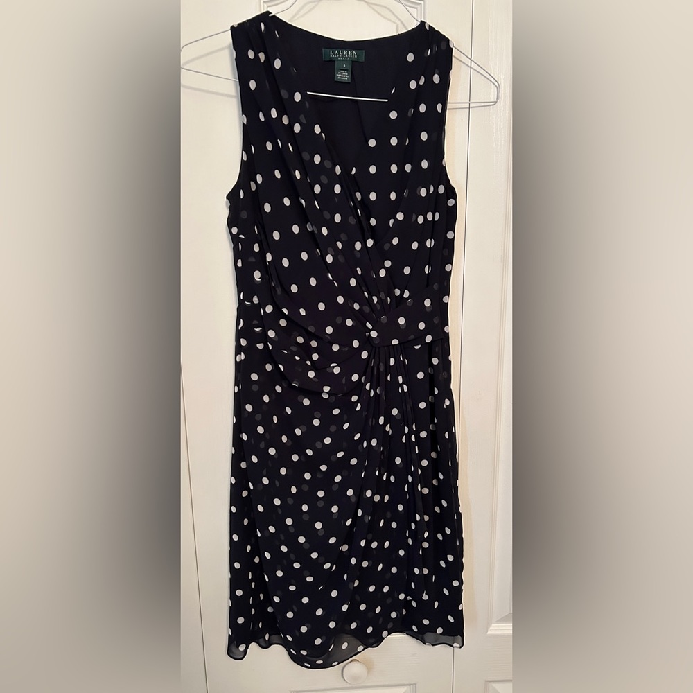 Ralph Lauren blue/white Polka dot dress, side zipper, lining underneath.
Size 8